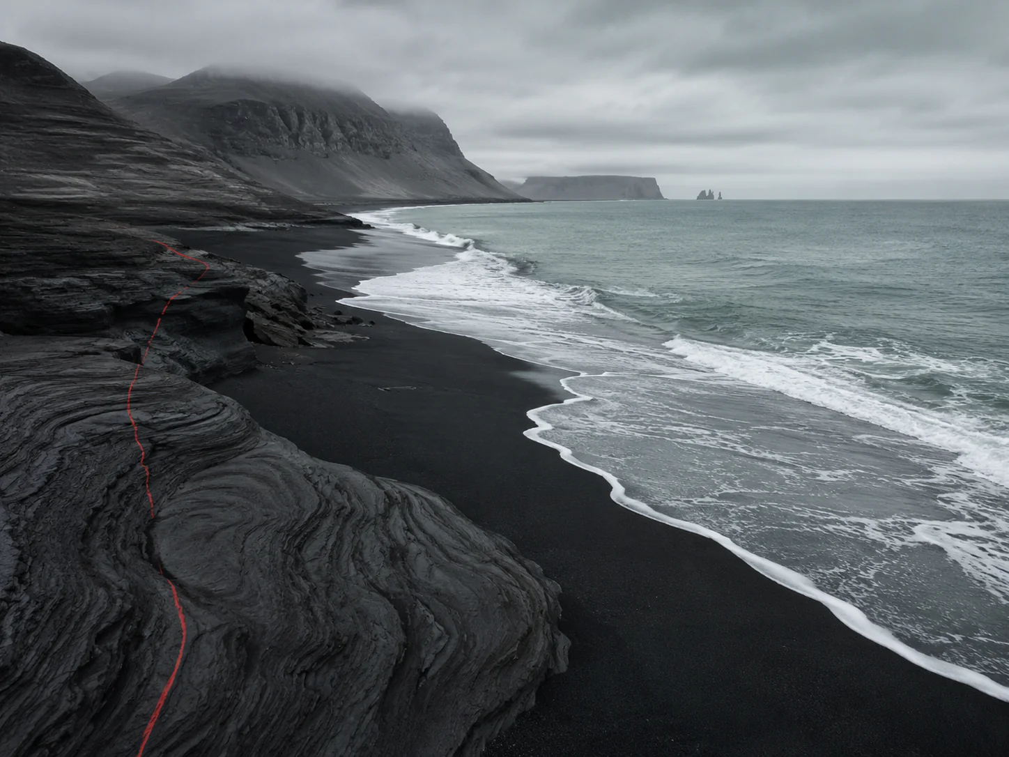 Swirl rock red line black bay